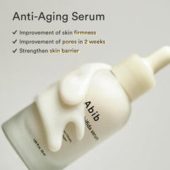 Goutte du sérum Abib montrant l’application ciblée sur le visage.