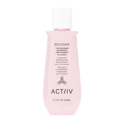 ACTIIV Recover botella en el baño, promesa de cabello más voluminoso y saludable.