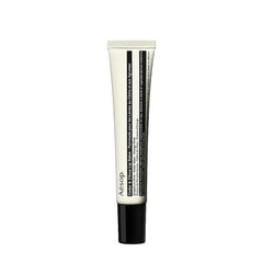 Balsamo labial Aesop con cedro y citricos en envase práctico para viajes