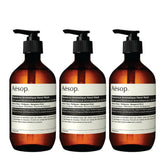 Aesop Reverencia Aromática lavado de manos, pack 3, botella visible, cuidado diario suave.