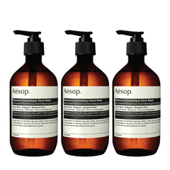 Aesop Reverencia Aromática lavado de manos, pack 3, botella visible, cuidado diario suave.