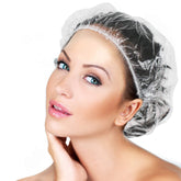 Gorro desechable AIDIQIU, paquete de 100 para spa y viaje, impermeable.