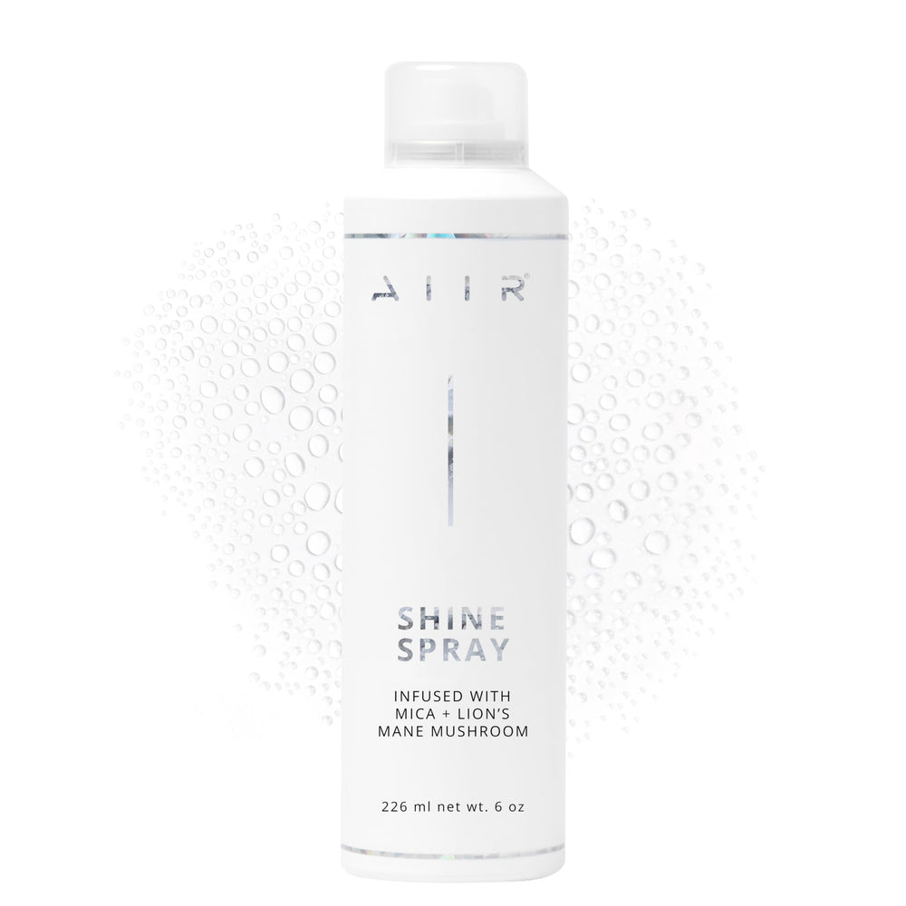 AIIR Shine Spray ofrece brillo ligero para peinado liso y suave.