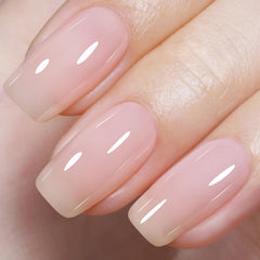 Esmalte gel AILLSA Milky Pink Nude, enfoque bote, tono suave para un look natural y elegante.