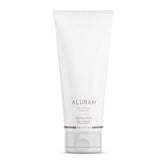 ALURAM Crema para Peinar con Agua de Coco, botella visible y hidratación suave para el cabello.