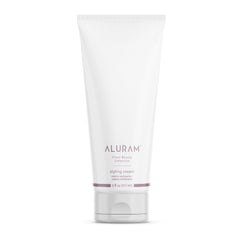 ALURAM Crema para Peinar con Agua de Coco, botella visible y hidratación suave para el cabello.
