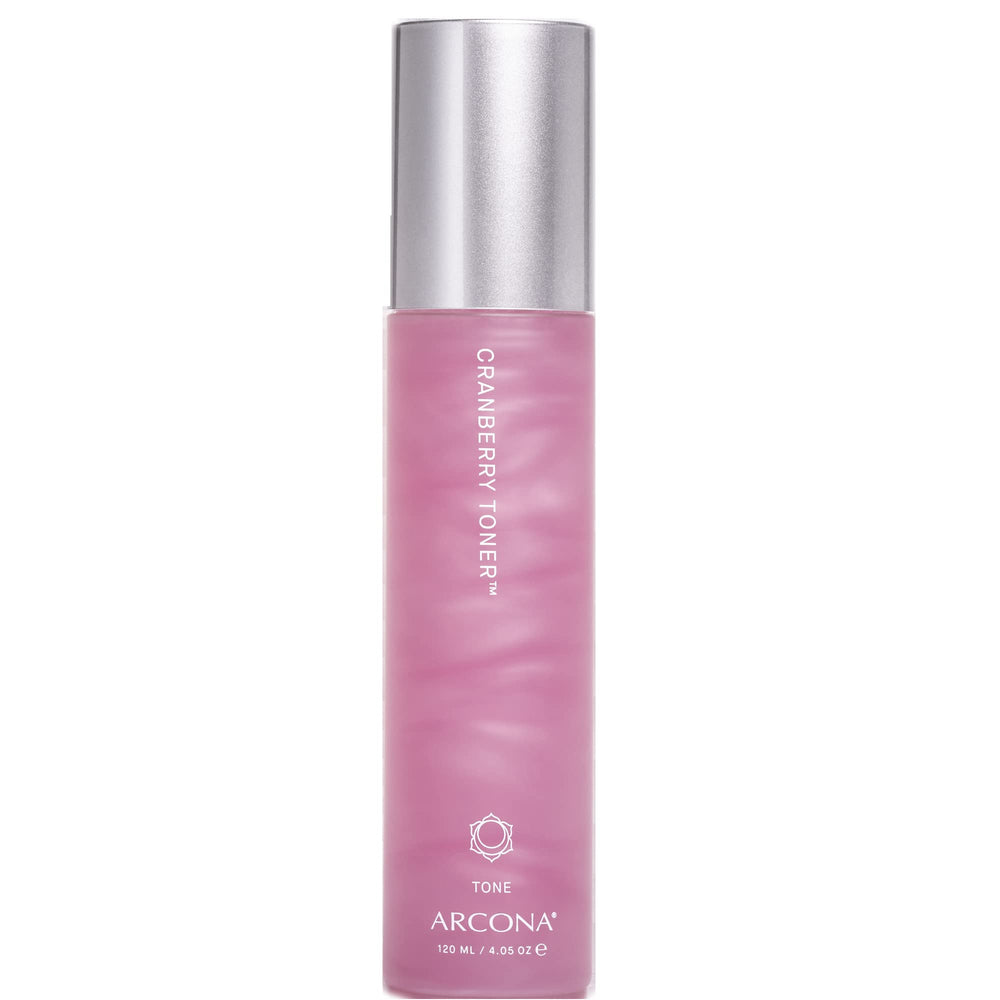 ARCONA Tónico de arándano en botella lechosa para hidratación suave.