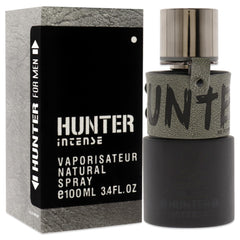 Armaf Hunter Intense, atomizador en uso, pulverización precisa para la aplicación diaria.