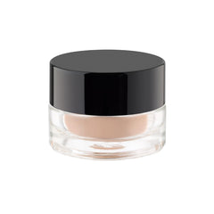 ARTDECO primer todo en uno para ojos aplicado con dedo para tono uniforme.