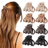 Pinza Atoden garra pulpo pequeña con acabado mate, agarre seguro para cabello fino.