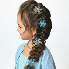 Atoden prendedor de pelo copo-nieve azul destellos, perfecto para looks invernales.