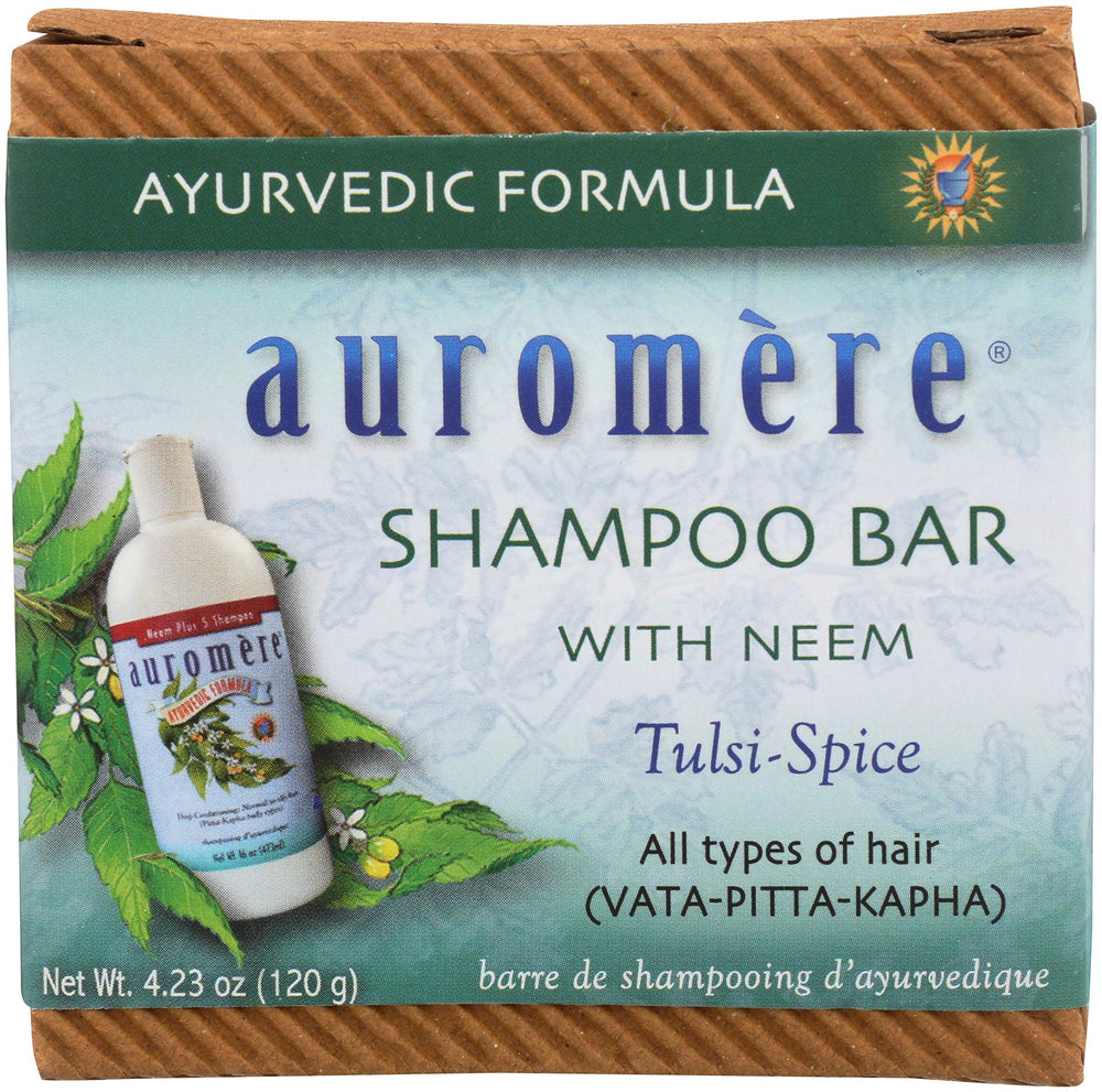 Barra Auromere shampoo, envase cero residuos, ideal para viajes.