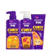 Aussie Kids champú para rizos, botella visible, cabello suave tras lavado.