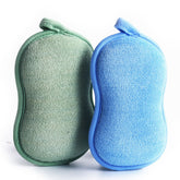 Esponja BabaMate para bebé con doble capa verde y azul, suave y duradera.