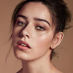 Close-up swatch on skin showing water- and sweat-resistant wear.