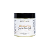 Bask & Lather Stimulating Scalp Balm bottle highlighting soothing hydration for a balanced scalp.