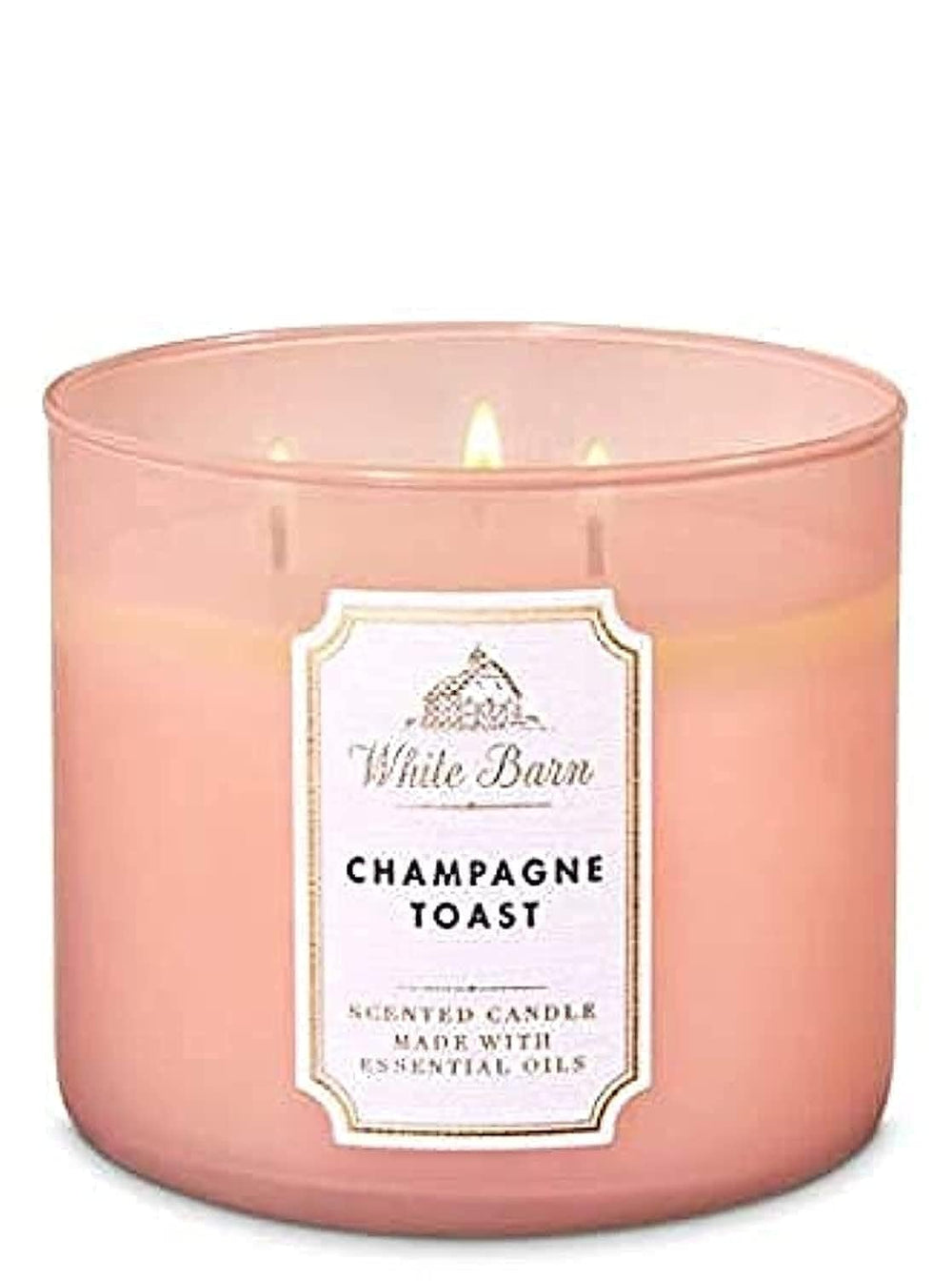 Bath & Body Works Champagne Toast, vela de tres mechas, crea ambiente festivo y fragante.
