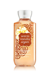 Bath & Body Works botella con etiqueta clásica, aroma vainilla cálida que perfuma la ducha.