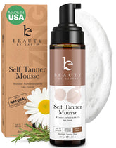 Beauty by Earth Self Tanner Mousse aplicada con guante para un bronceado uniforme.