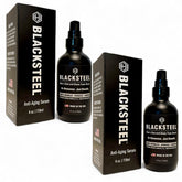 Sérum BLACKSTEEL pour homme, bouteille matte-noir, absorption rapide et peau hydratée.
