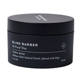 Frente del envase Blind Barber cera capilar, aroma tonka suave.