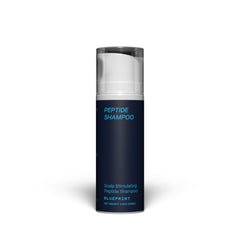 Shampoo Blueprint Bryan Johnson, botella visible para lavado diario y cabello limpio.