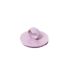Boie Face Scrubber aplica limpiador para purificar poros mediante movimientos circulares.