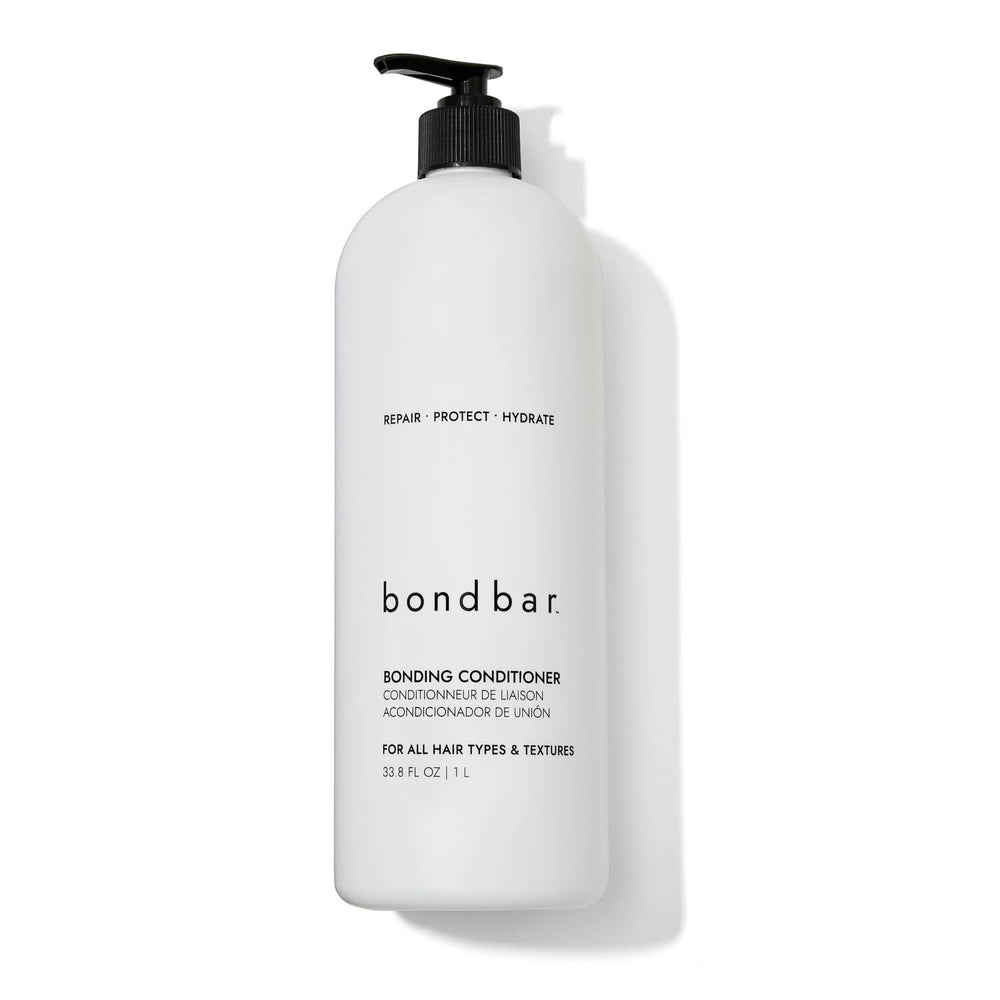 Acondicionador Bondbar para cabello dañado, textura cremosa que aporta suavidad.