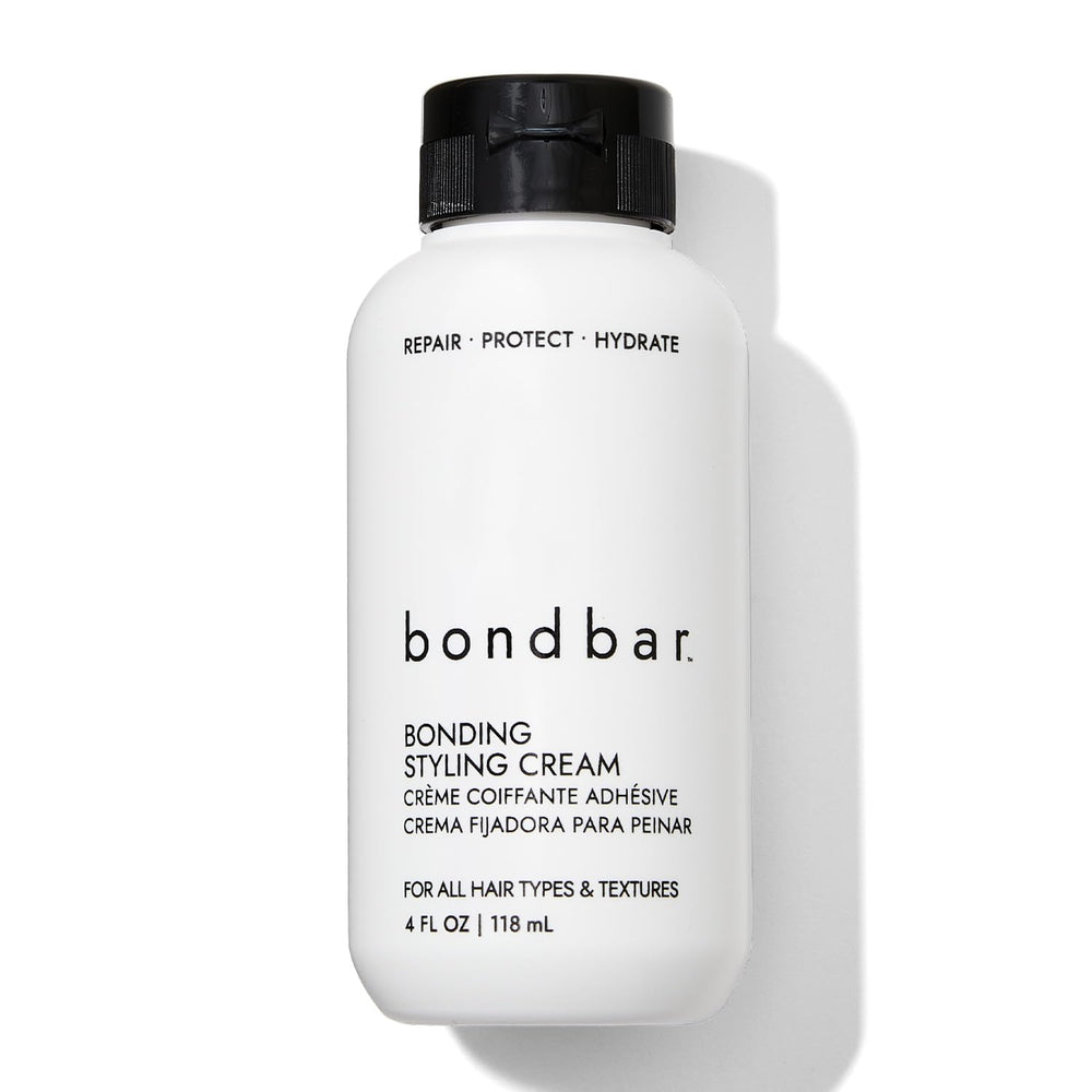 Bondbar crema para peinado, botella visible, ayuda a reparar y suavizar el cabello.