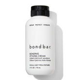 Bondbar crema para peinado, botella visible, ayuda a reparar y suavizar el cabello.