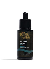 Bondi Sands Gotas Bronceado Oscuro sobre botella, ideal para bronceado gradual y personalizado.
