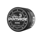 Bossman pomada para cabello y barba con empaque compacto para uso diario.
