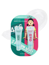 BRING GREEN edición Squid Game: esencia labial hialurónico en bambú para hidratación duradera.