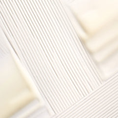 Briogeo Curl Charisma hidrata y controla el encrespamiento para rizos definidos.