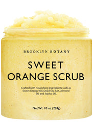 Brooklyn Botany Sweet Orange Scrub, botella vertiendo, exfolia suavemente la piel.