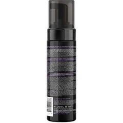 B.TAN Violet Base Self Tanner Mousse texture closeup shows smooth, streak-free application.