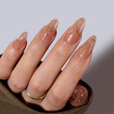 BTArtbox uñas en forma almendra con líneas doradas 3D para un look elegante.