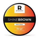 BYROKKO Shine crema bronceadora, textura suave para un bronceado más intenso.