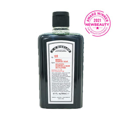 Etiqueta de C.O. Bigelow baño de hierbas reconfortante con ingredientes naturales.