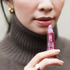 C.O. Bigelow Plum Mentha Lip Tint con aceite de menta para sensación fresca.