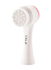 Cepillo facial Cala doble acción con cerdas suaves rosa para limpieza profunda de poros.