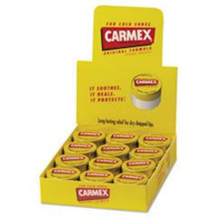 Carmex Balsamo Labial Jar detalle textura: se funde suavemente con manteca de cacao.