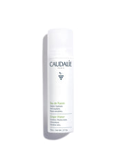 Caudalie bruma facial agua de uva, botella elegante para hidratación instantánea.