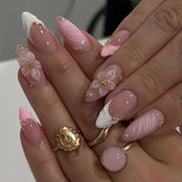 CnSybaris uñas 3D con flores en relieve en almendra rosa, ideal para uso diario.