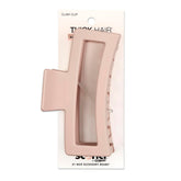 Pinza Scúnci para cabello grueso en rosa suave, agarre seguro para peinados.