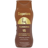 Coppertone loción bronceadora SPF 15 en botella de 8oz para uso diario al sol.