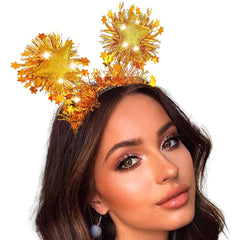 Coridy banda-cabeza con luces y estrellas doradas, ideal para fiestas.