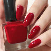COSMOO Esmalte rojo, botella vista frontal, secado rápido para uñas brillantes.