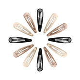 Pinzas Cptots de metal con gota de agua en negro, agarre seguro para cabello grueso.