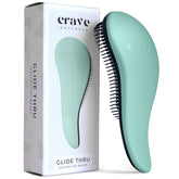 Crave Naturals Glide Thru en turquesa, desenreda nudos con suavidad.